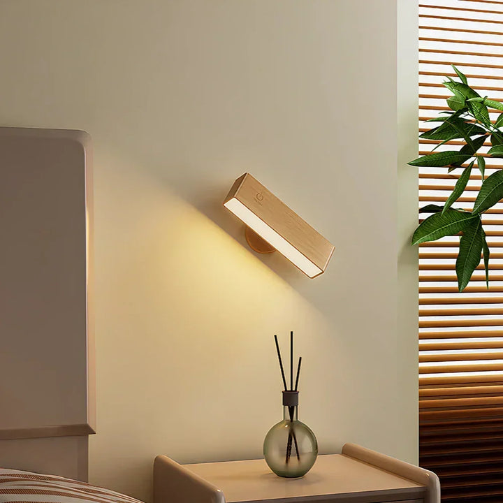 Éclairage mural LED sans fil et rechargeable, dimmable, avec fixation magnétique pratique.