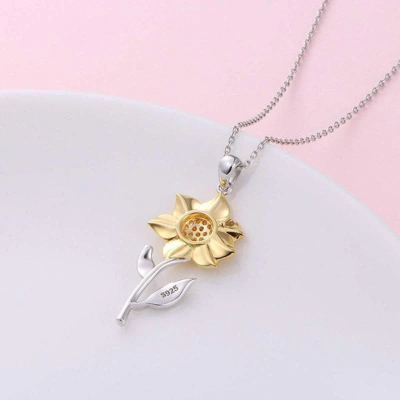 Collier femme tournesol doré, bijou élégant. Pendentif hypoallergénique en cristal plaqué or.