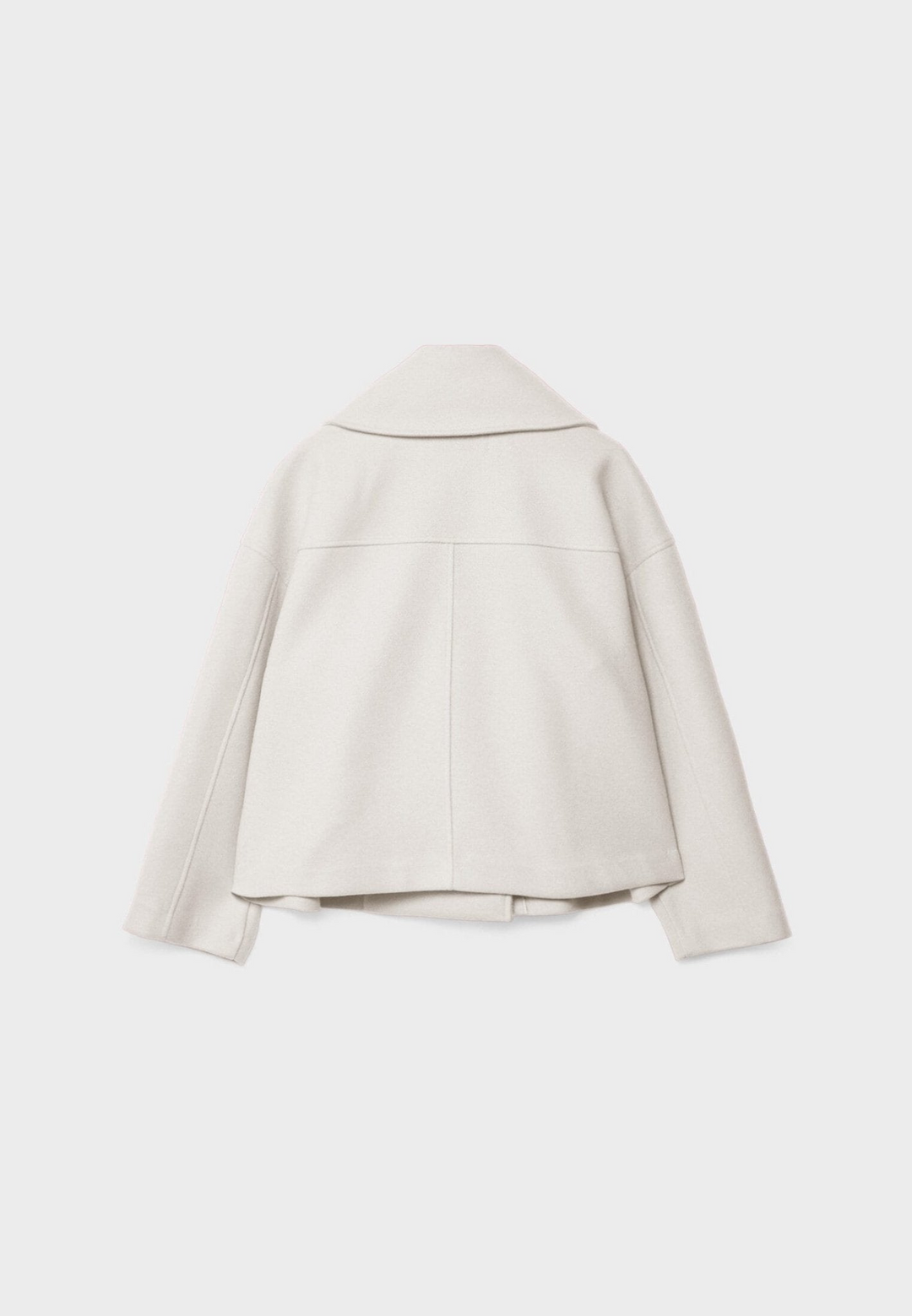 Élégante veste courte femme, esprit tailleur, pour un style moderne et raffiné.