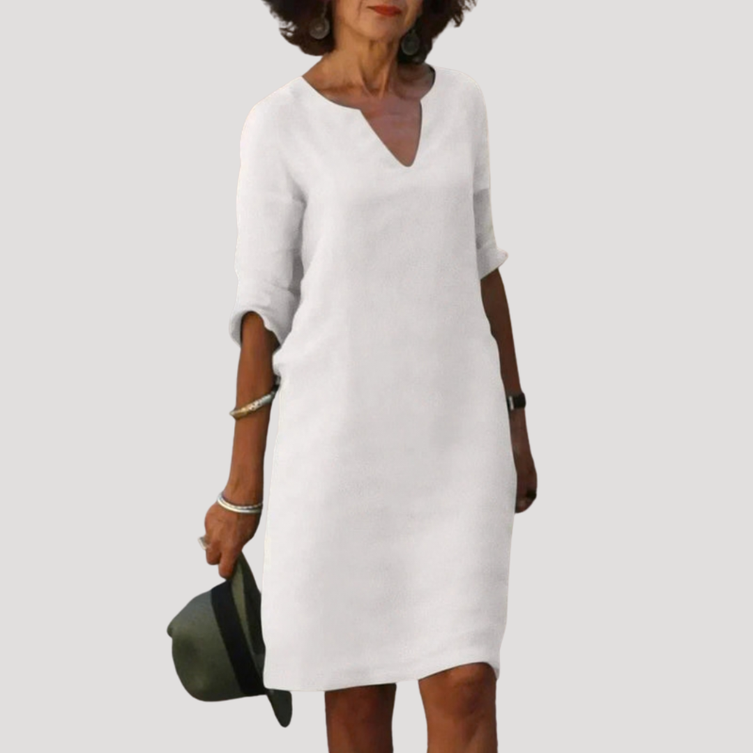 Robe midi chic et polyvalente pour femme, un vêtement fluide et confortable, idéal pour un style élégant au quotidien.