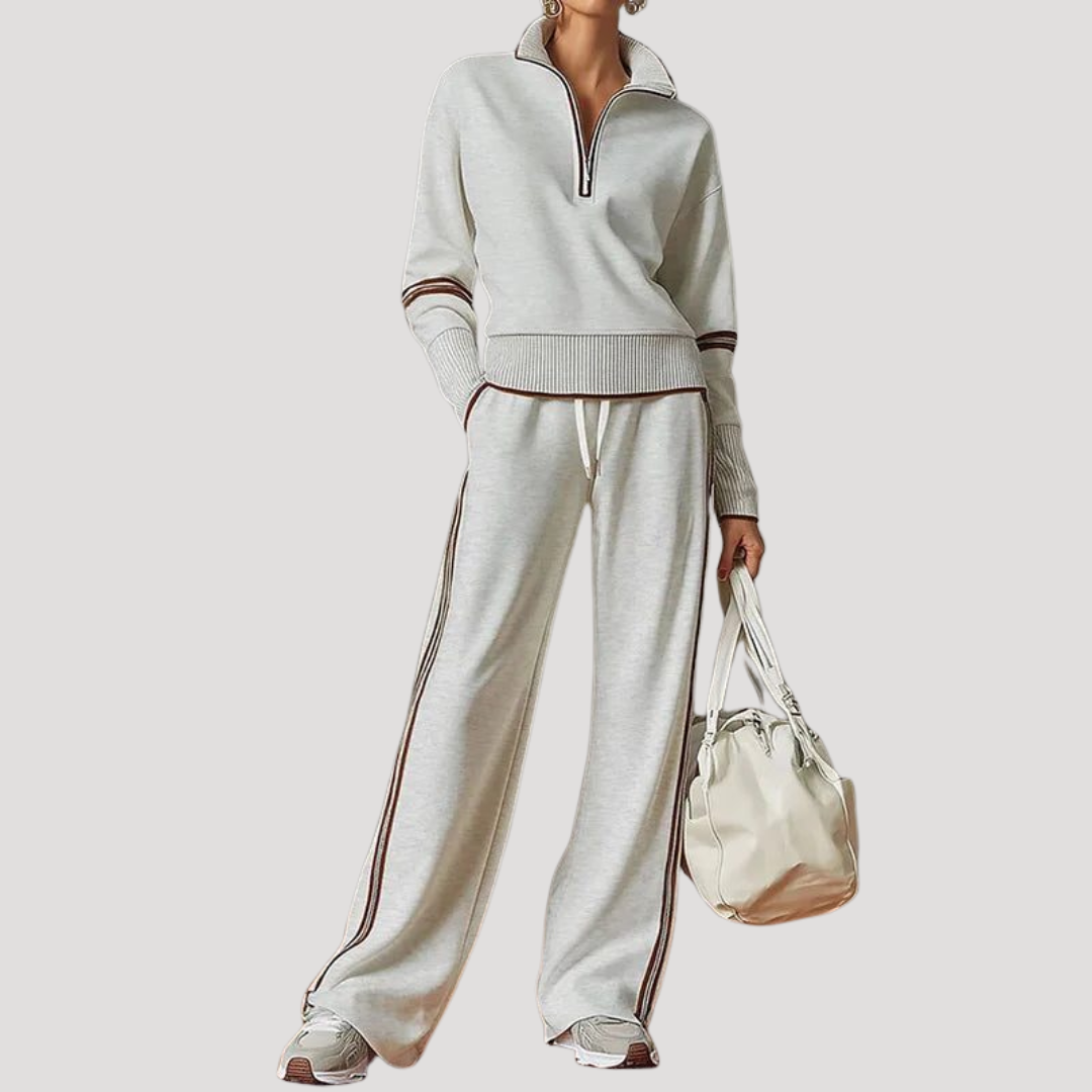 Vêtements coordonnés femme en maille douce, haut col zippé et pantalon large. Style décontracté chic.