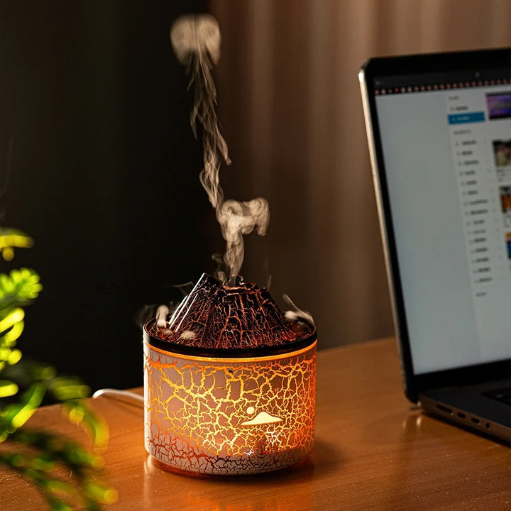 Appareil d'aromathérapie 'volcan' avec lumière LED et brume, créant une ambiance zen et relaxante.