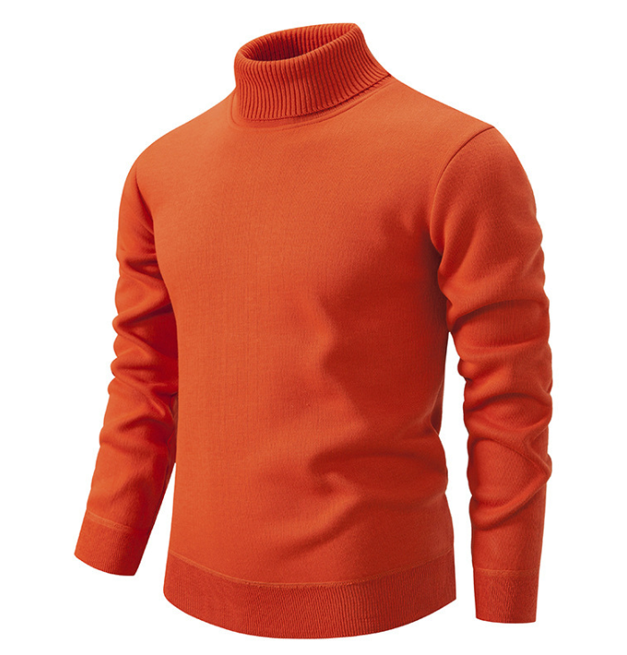 Homme en pull col roulé bleu marine, manches longues. Look urbain hivernal chaud, décontracté chic et confortable.