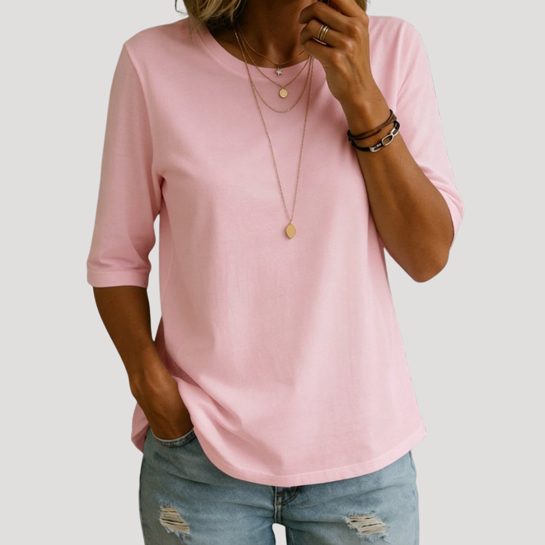 T-shirt décontracté femme, coupe confortable. Col rond classique, manches 3/4. Chic et facile à porter.
