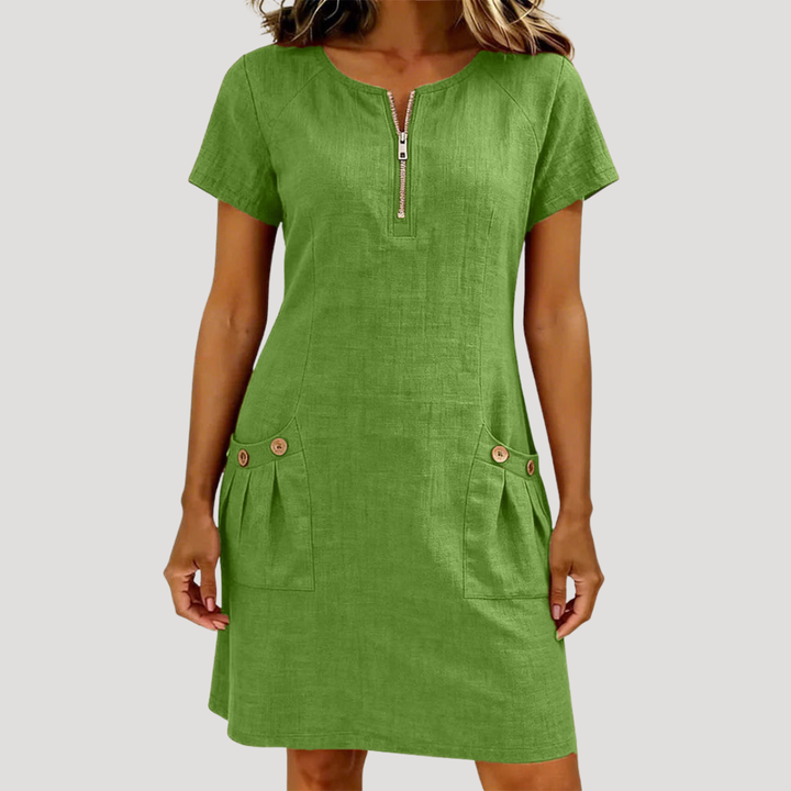 Robe courte zippée décontractée pour femme, polyvalente pour l'été et le printemps. Look facile et moderne.