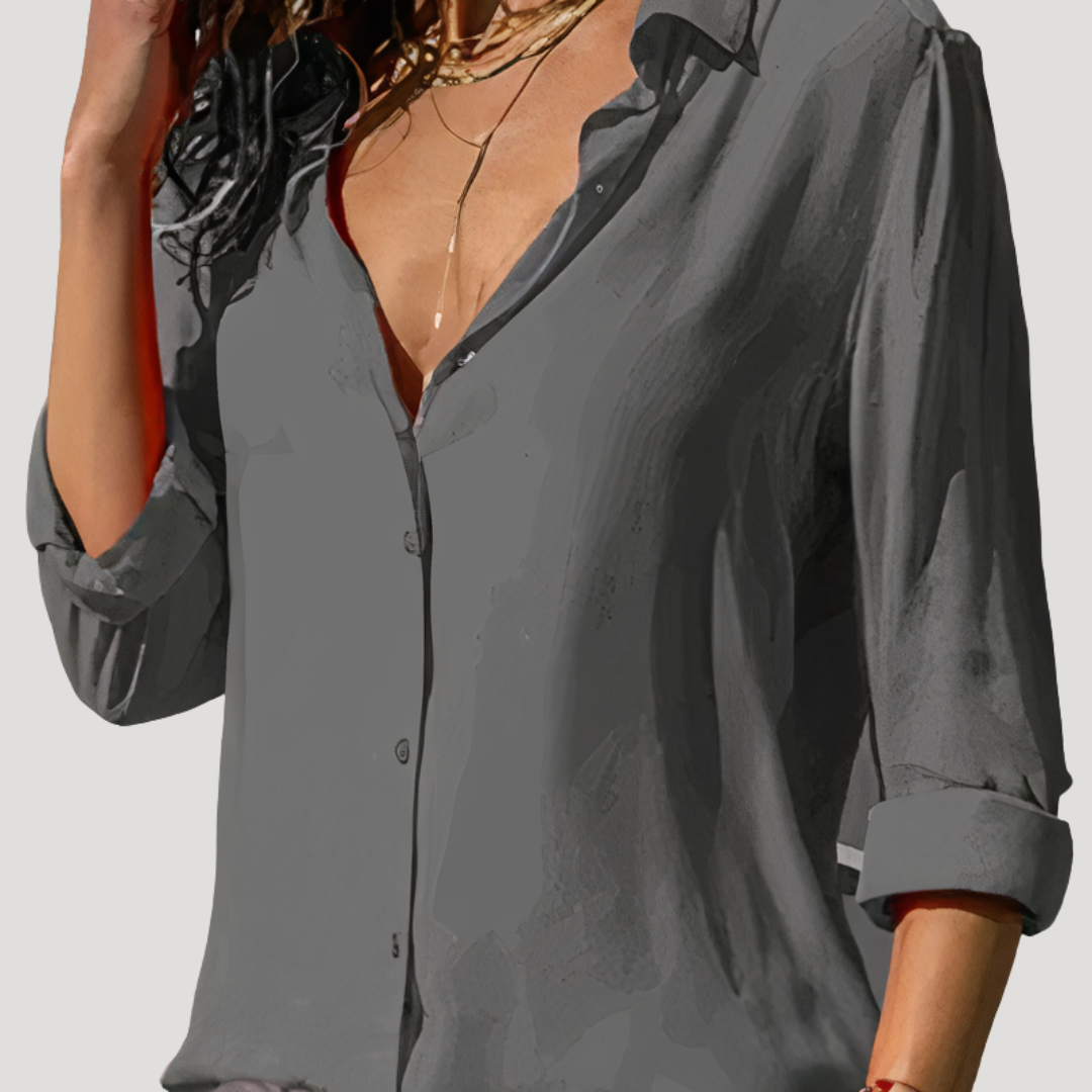 Blouse fluide printemps-été pour femme, design élégant et moderne, parfaite pour un style sophistiqué.