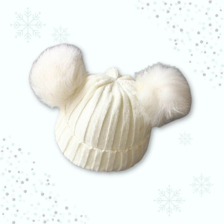 Ensemble hiver chic bonnet et écharpe pour bébé. Un accessoire mode enfant qui combine chaleur et élégance.