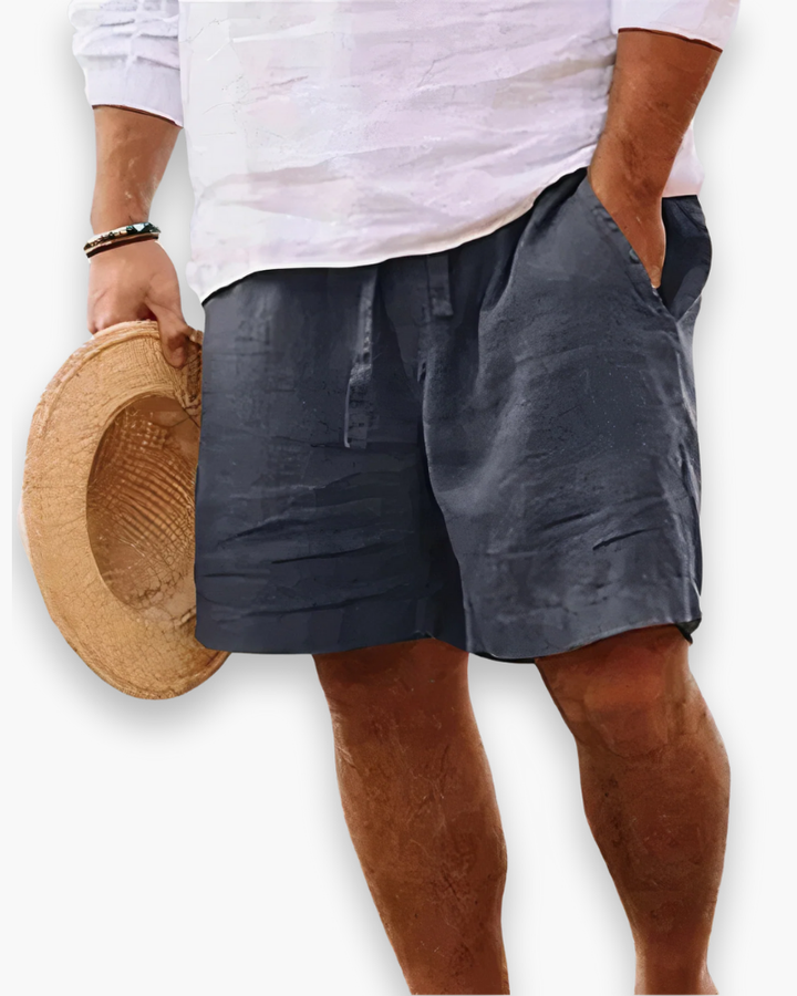 Gros plan sur le tissu respirant du short homme, doux et confortable pour l'été.
