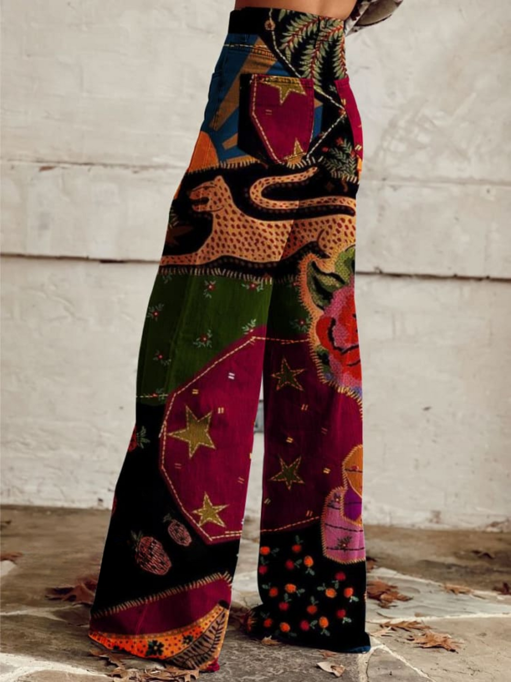 Pantalon large imprimé Olivia confortable pour femme, design fluide multicolore, parfait pour une mode chic.