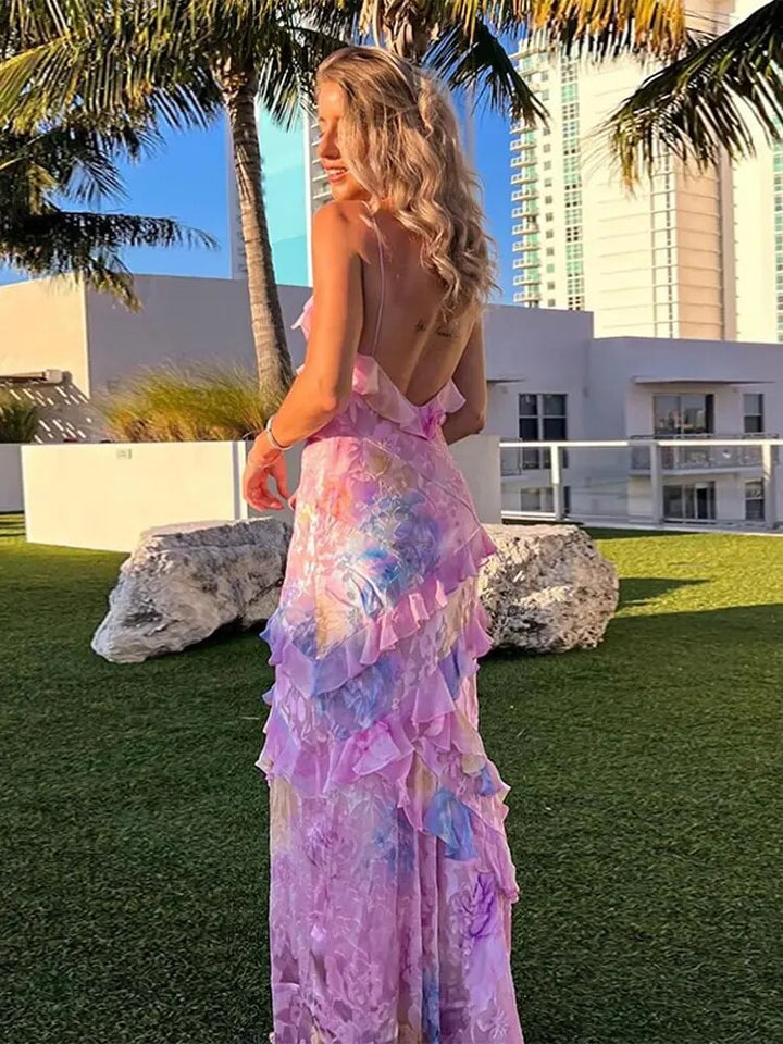 Robe longue femme colorée et fluide style bohème, avec des volants, pour un look féminin et décontracté en été.