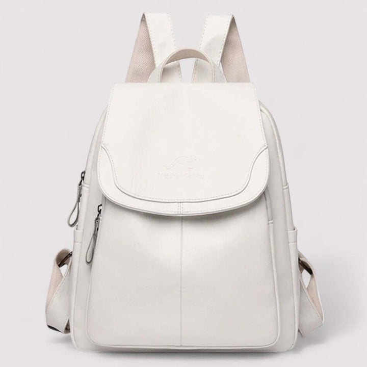 Sac à dos en cuir noir élégant pour homme et femme, avec design antivol pour une sécurité optimale en ville.