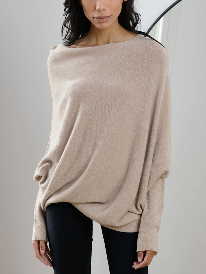Pull femme tendance pour l'hiver. Élégant, confortable et chaud, un essentiel mode pour un look décontracté.
