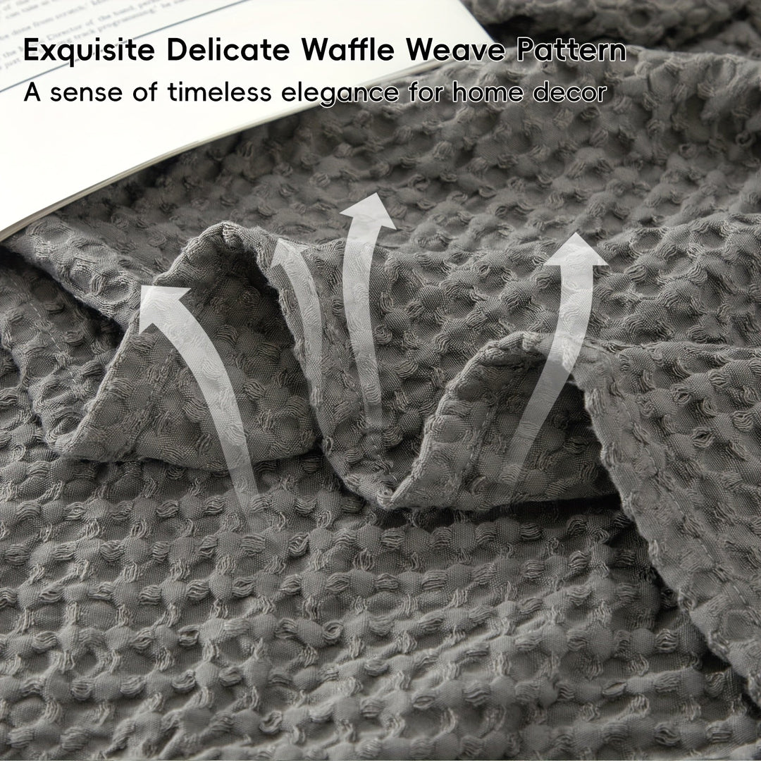 Plaid décoratif Cloudweave, tissu gaufré doux, idéal pour ajouter une touche de sophistication à la pièce.