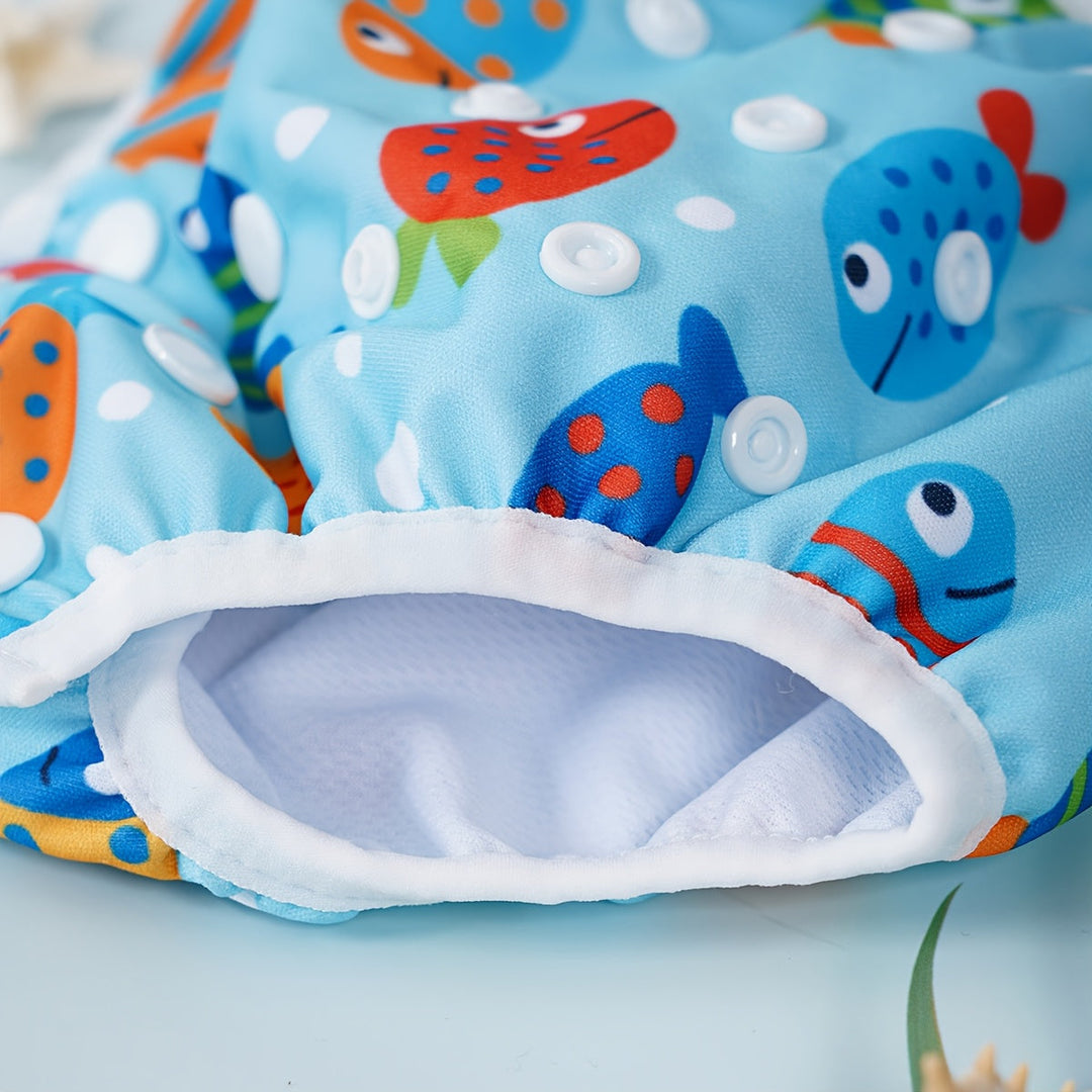Maillot de bain enfant lavable et réglable, imprimé poissons, tortues, crabes. Idéal pour la plage.