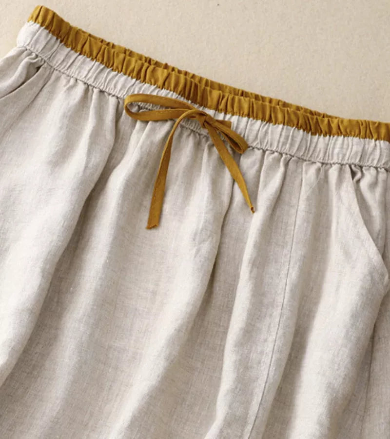 Jupe femme confortable taille haute A-line, mi-longue brodée, parfaite pour un look d'été.