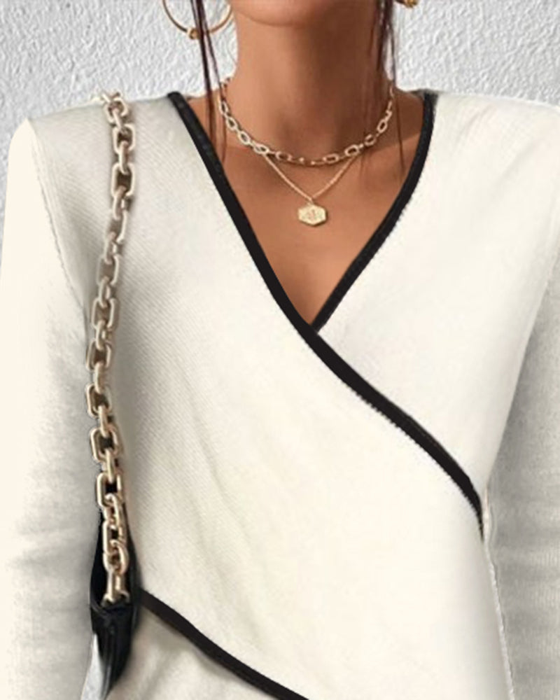 Pull col V femme confortable et tendance, maille douce, parfait pour la mode féminine automne-hiver.