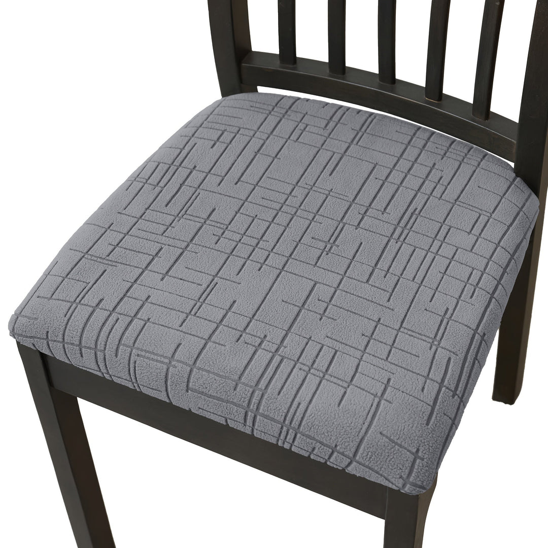 Housse moderne vert olive pour chaise de salle à manger, protection efficace et esthétique pour votre ameublement.