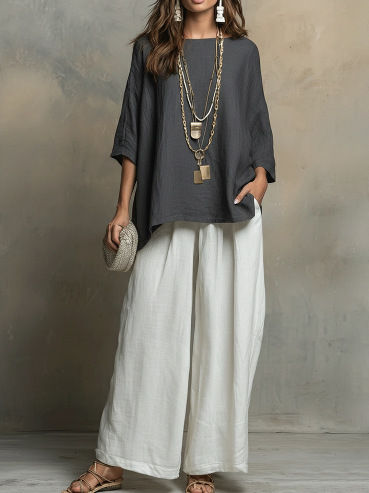 Tenue d'été décontractée: ensemble femme deux pièces ample, pantalon fluide et haut léger, confort absolu.