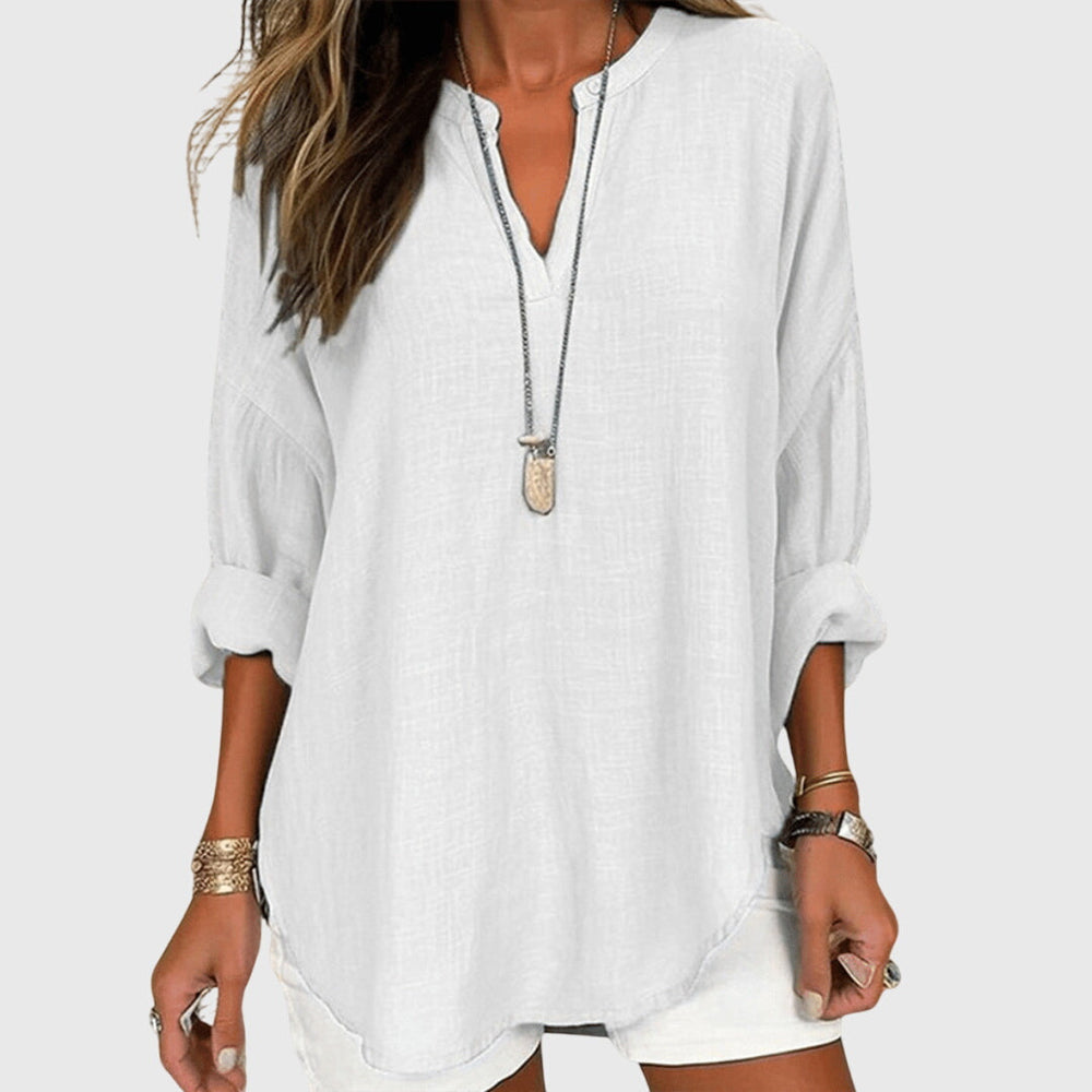 Chemise femme fluide et légère pour la plage, style décontracté chic, idéale pour l'été et les vacances.