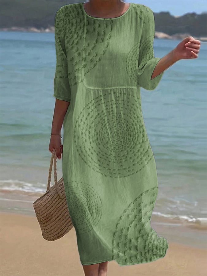 Robe femme midi chic en coton lin fluide motif texturé, manches 3/4. Idéale pour les vacances d'été.