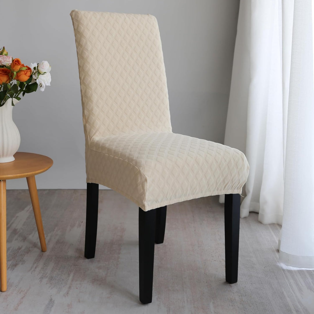 Housses de chaise extensibles, motif feuille. Solution rapide pour protéger et décorer votre intérieur.