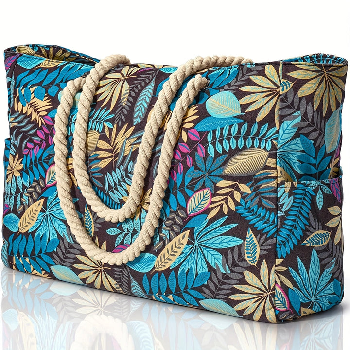 Sac de plage femme chic, imprimé feuilles tropicales. Grand et léger, idéal pour une journée à la mer.