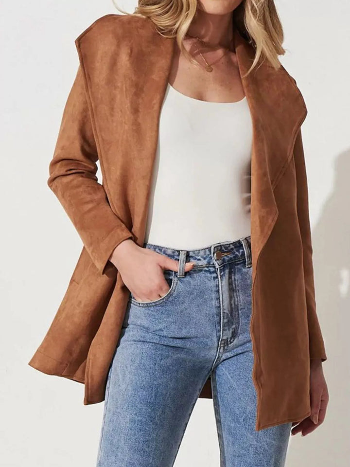 Veste fluide femme sophistiquée, alliant confort et élégance décontractée. Parfaite pour la mi-saison.