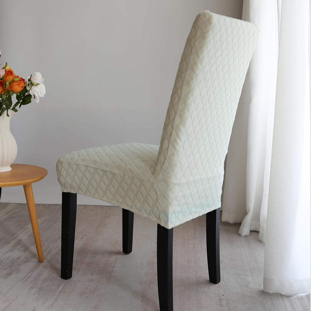 Housse de chaise motif feuille, vue du dos. Protection complète pour votre ameublement.