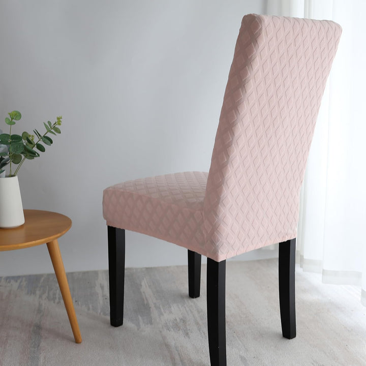 Housse de chaise extensible, motif diamant. Redonne vie à vos chaises de salle à manger.