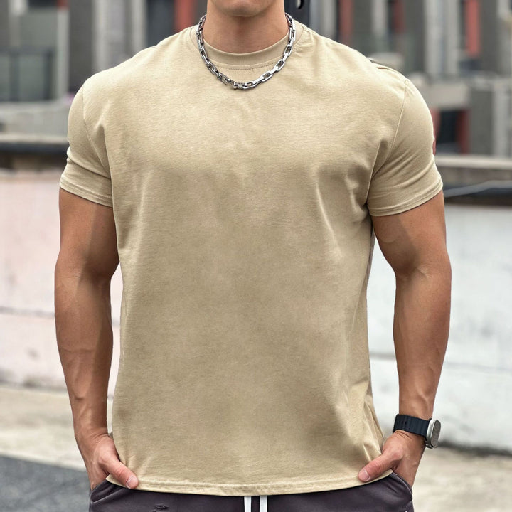 T-shirt athlétique homme ample, pour fitness, course et entraînement. Confort et respirabilité garantis.
