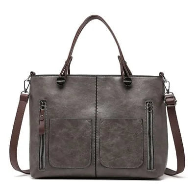 Sac à main femme chic, cuir PU noir avec bandoulière ajustable, parfait pour une tenue moderne.