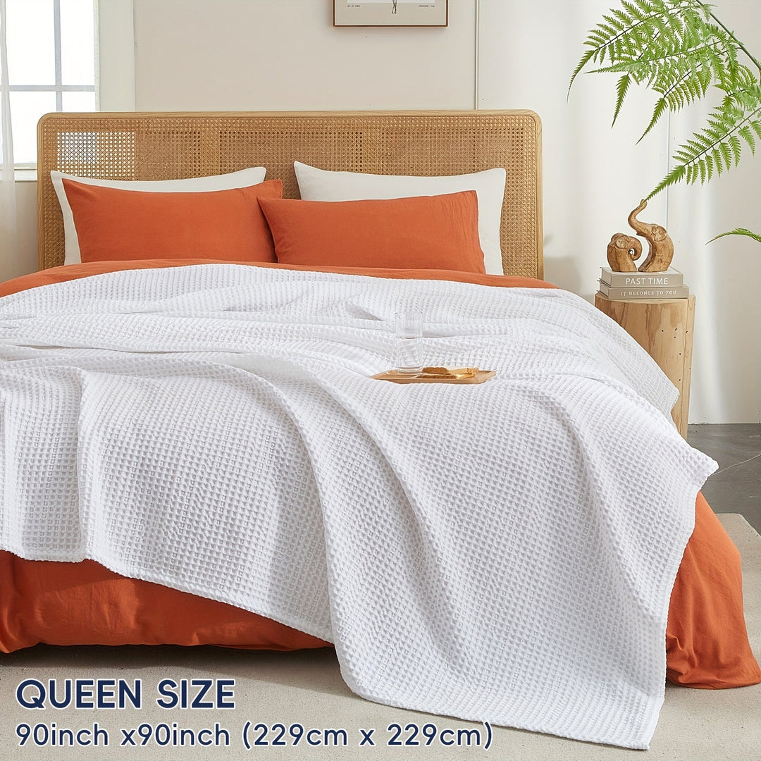 Plaid léger Cloudweave pour la chambre, offre douceur et confort toute l'année, un vrai cocooning.