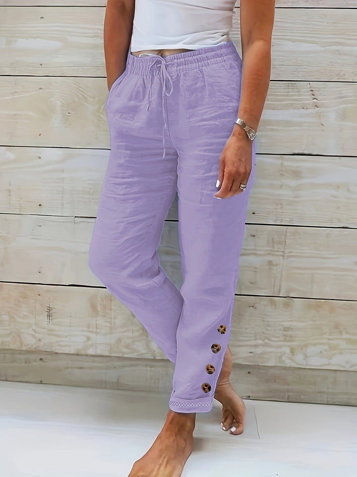 Pantalon femme élégant, coupe droite ajustée, idéal pour la mode femme polyvalente.