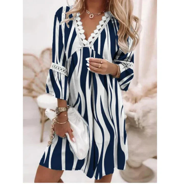 Robe d'été fleurie élégante pour femme, idéale pour un confort printanier.