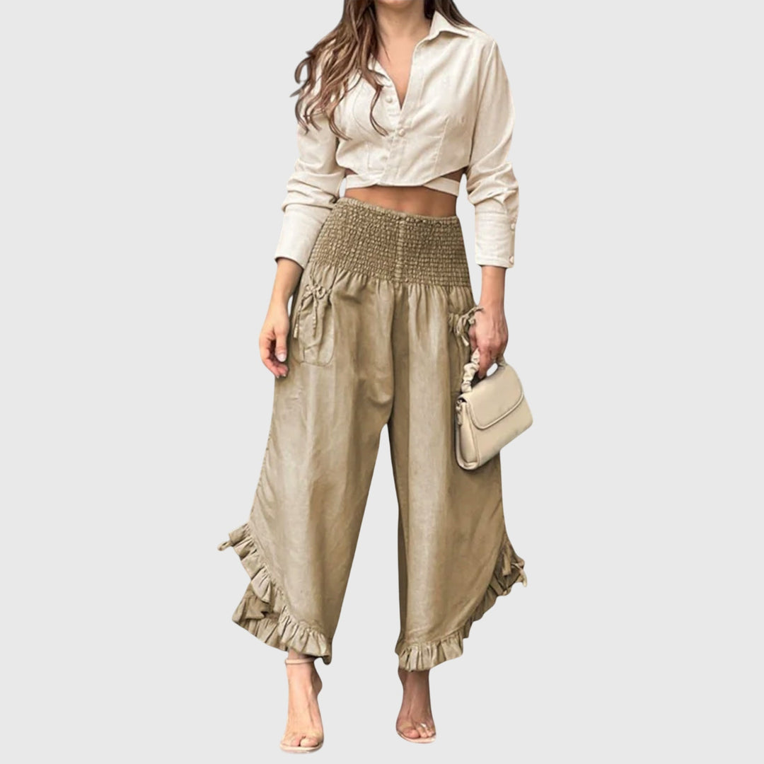 Pantalon plissé femme Jaya beige, chic et confortable. Idéal pour un look décontracté ou élégant.