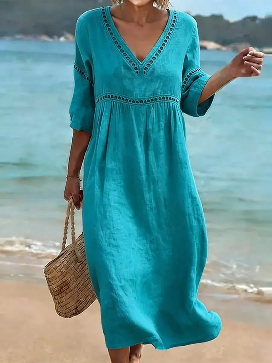 Vêtement femme élégant décontracté : robe coton col V, coupe fluide. Confortable pour le printemps-été.
