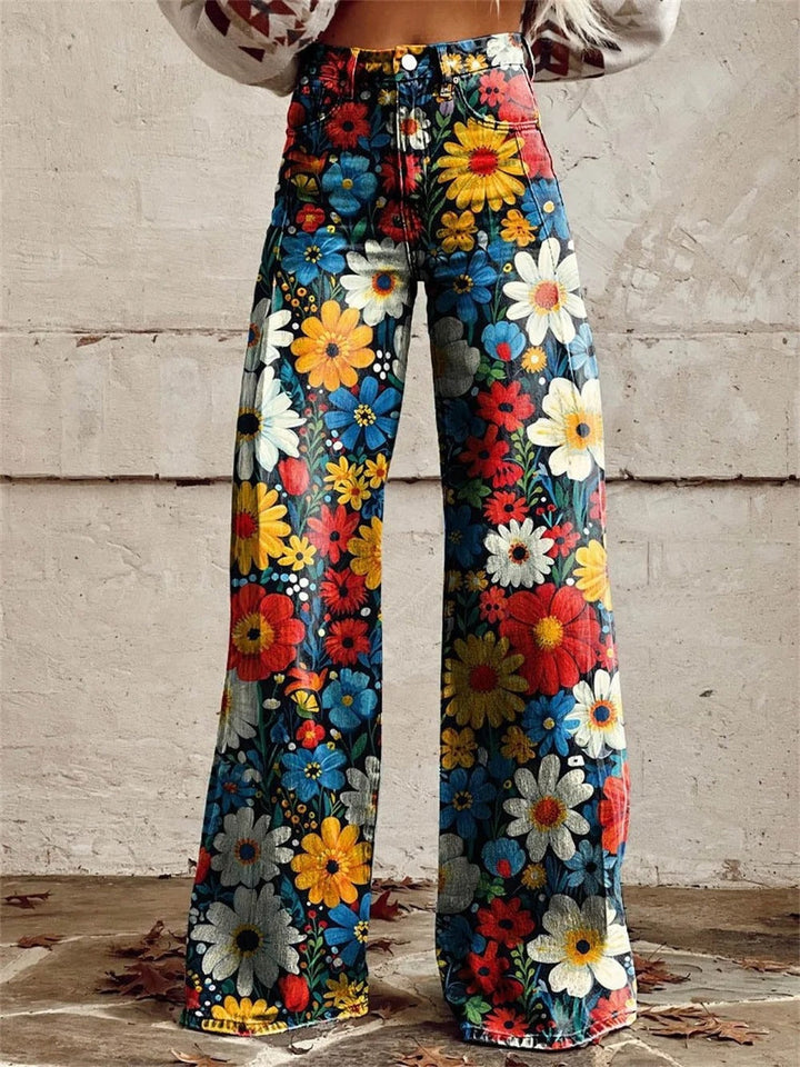 Pantalon large femme fluide à imprimé floral vif, parfait pour un look d'été chic et confortable.