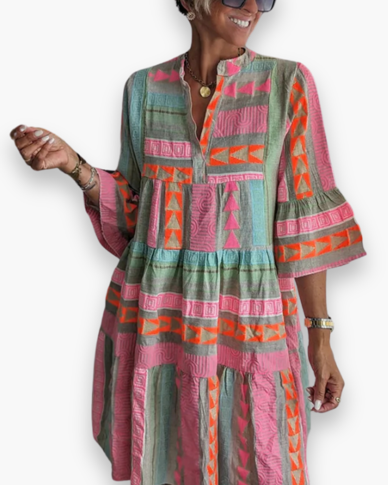 Robe bohème ample femme mi-longue et élégante, parfaite pour l'été, la plage et les vacances décontractées.