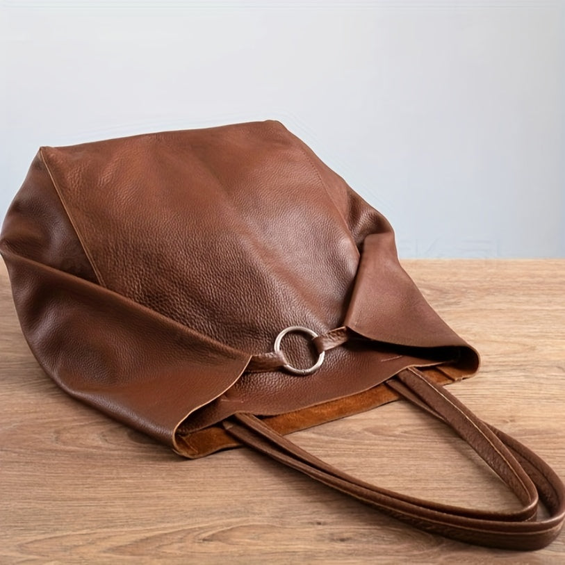 Sac tote femme en simili cuir doux, vue latérale. Un accessoire élégant et pratique pour vos activités quotidiennes.