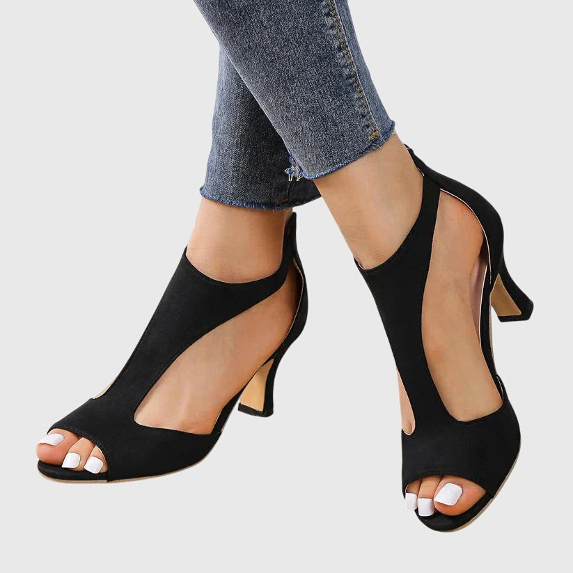 Talons orthopédiques femme noirs/roses, alliant élégance, hauteur et confort supérieur pour le bien-être des pieds.