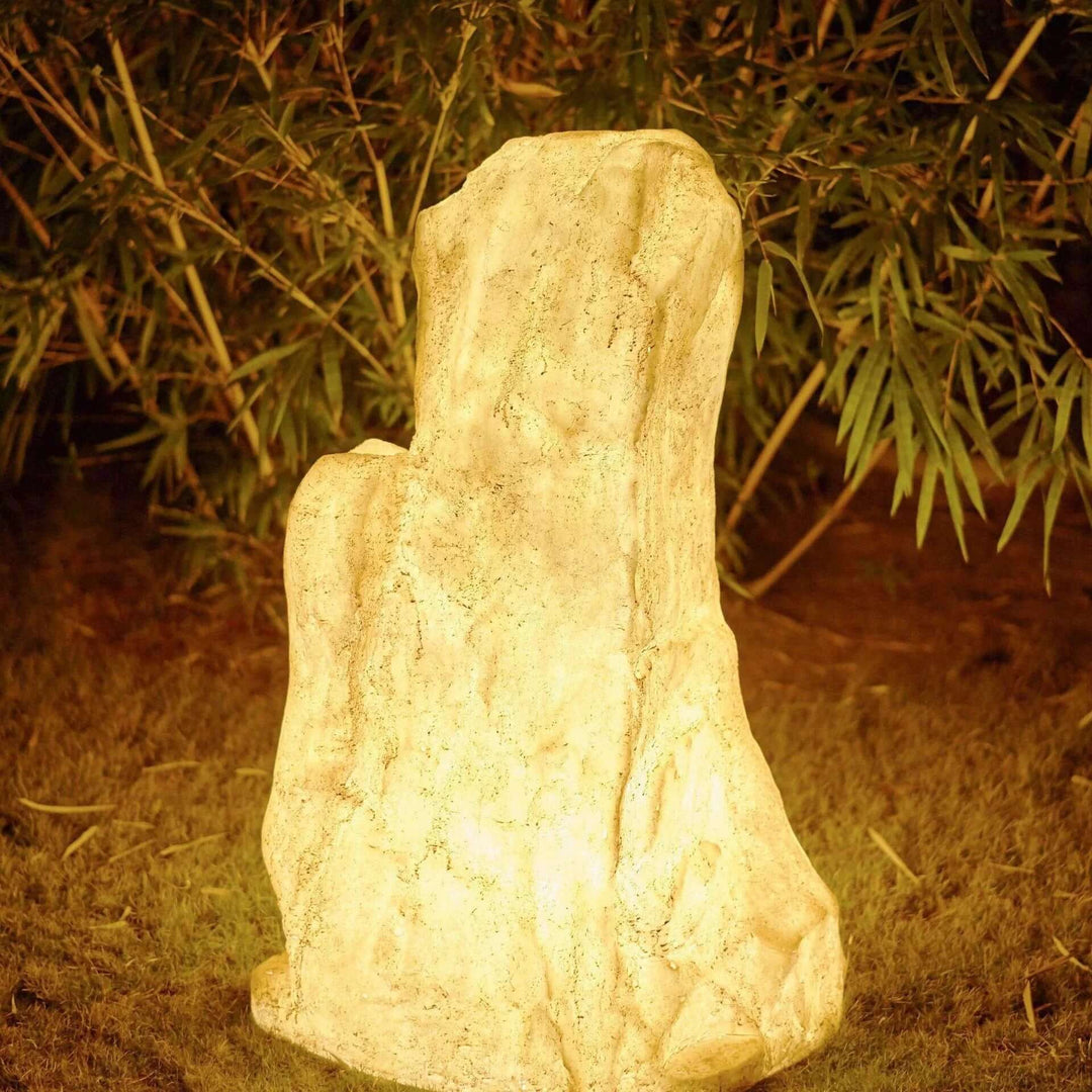 Lampe de jardin créant une ambiance douce, effet pierre naturelle. Éclairage extérieur solaire résistant aux éléments.
