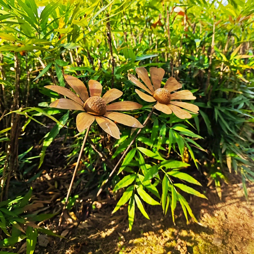 Tuteur en métal fleur de camomille, sculpture décorative pour jardin et aménagement paysager rustique.