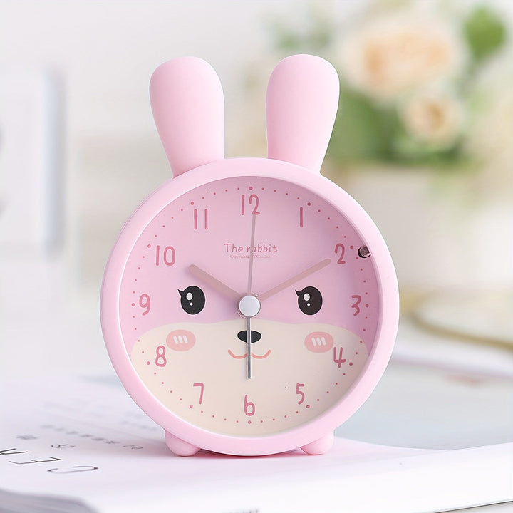Réveil enfant silencieux BunnyTime en forme de lapin avec veilleuse douce, parfait pour matins calmes en chambre.