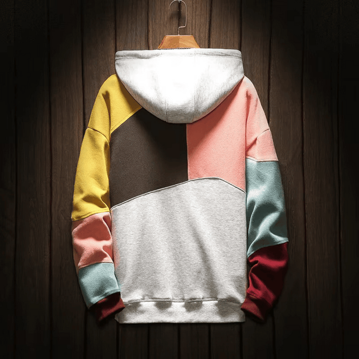 Pull à capuche homme, mode urbaine, design coloré et contemporain pour un look dynamique et confortable.