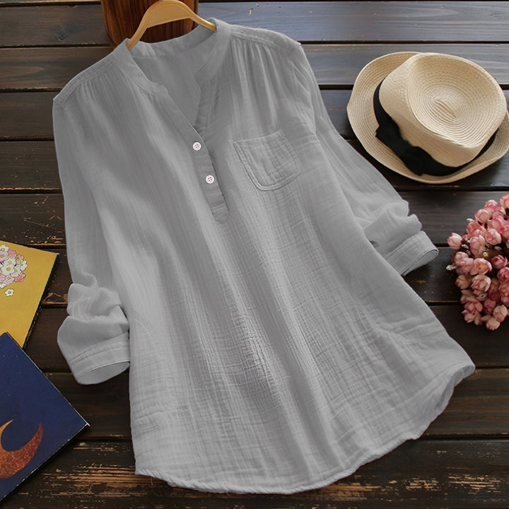 Blouse femme ample et confortable, adaptée à toutes les silhouettes. Un classique intemporel et polyvalent.