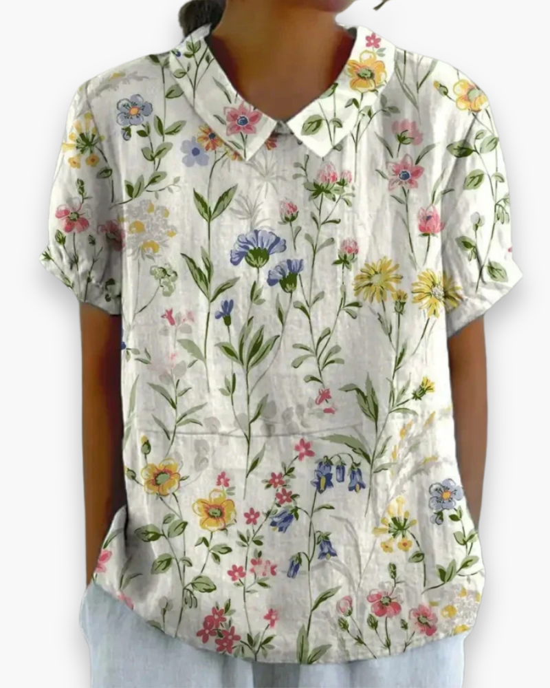 Blouse femme à motif floral élégant, confortable et légère, idéale pour le printemps.