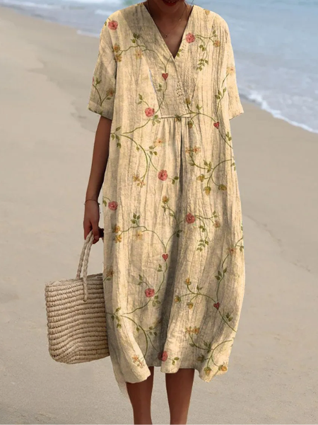 Robe florale printemps-été, femme, look confortable et chic, motif vibrant pour mode plage.
