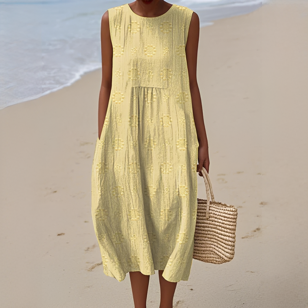 Robe femme élégante sans manches, longueur midi, idéale pour les vacances ou un look estival chic et confortable.