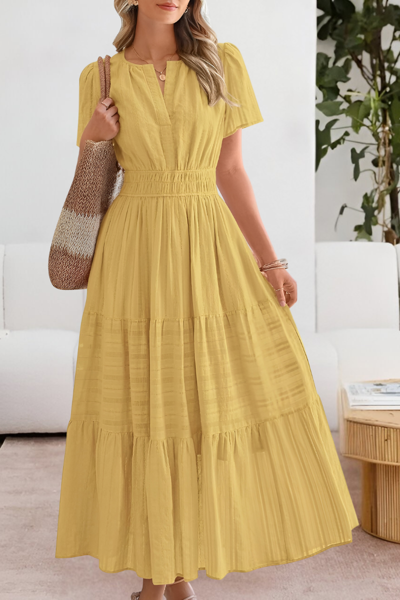Robe midi fluide bohème pour femme, élégante et confortable, idéale pour l'été et les vacances.