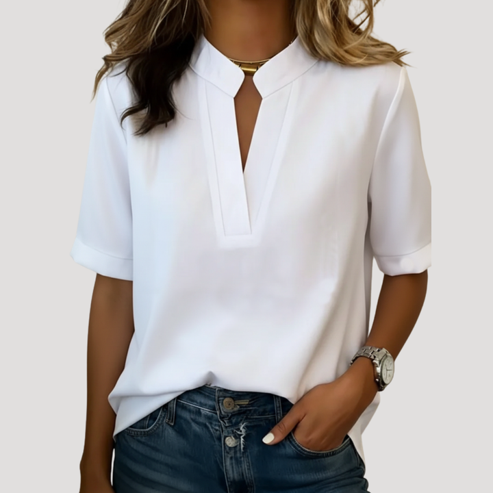 Blouse femme col V et manches courtes, design chic et fluide. Parfaite pour un style mode et confortable.